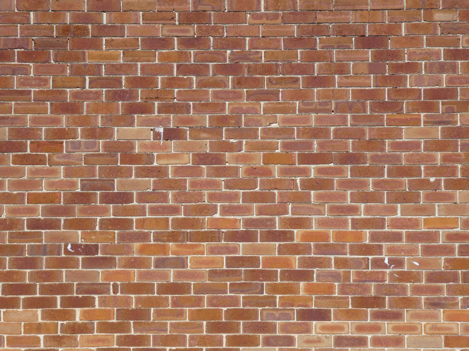 Close-up van een gevel in rode baksteen